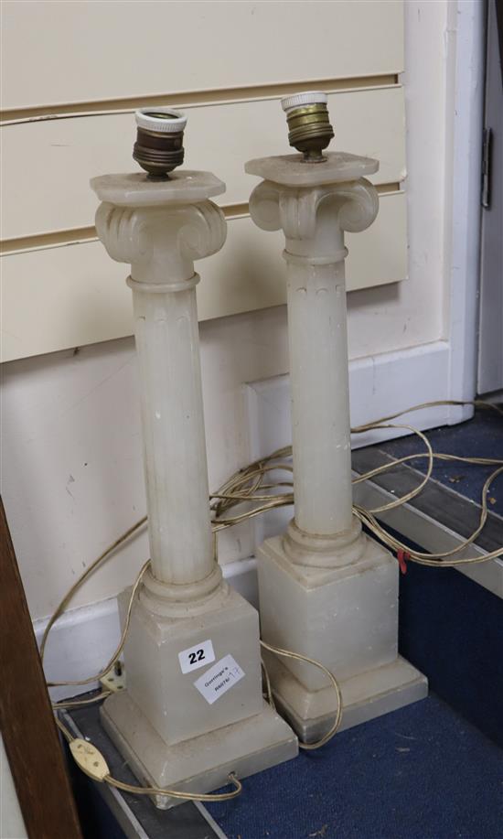 A pair of alabaster lamp bases